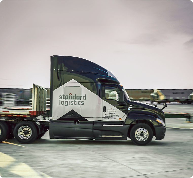 Side view of a Standard Logistics truck.