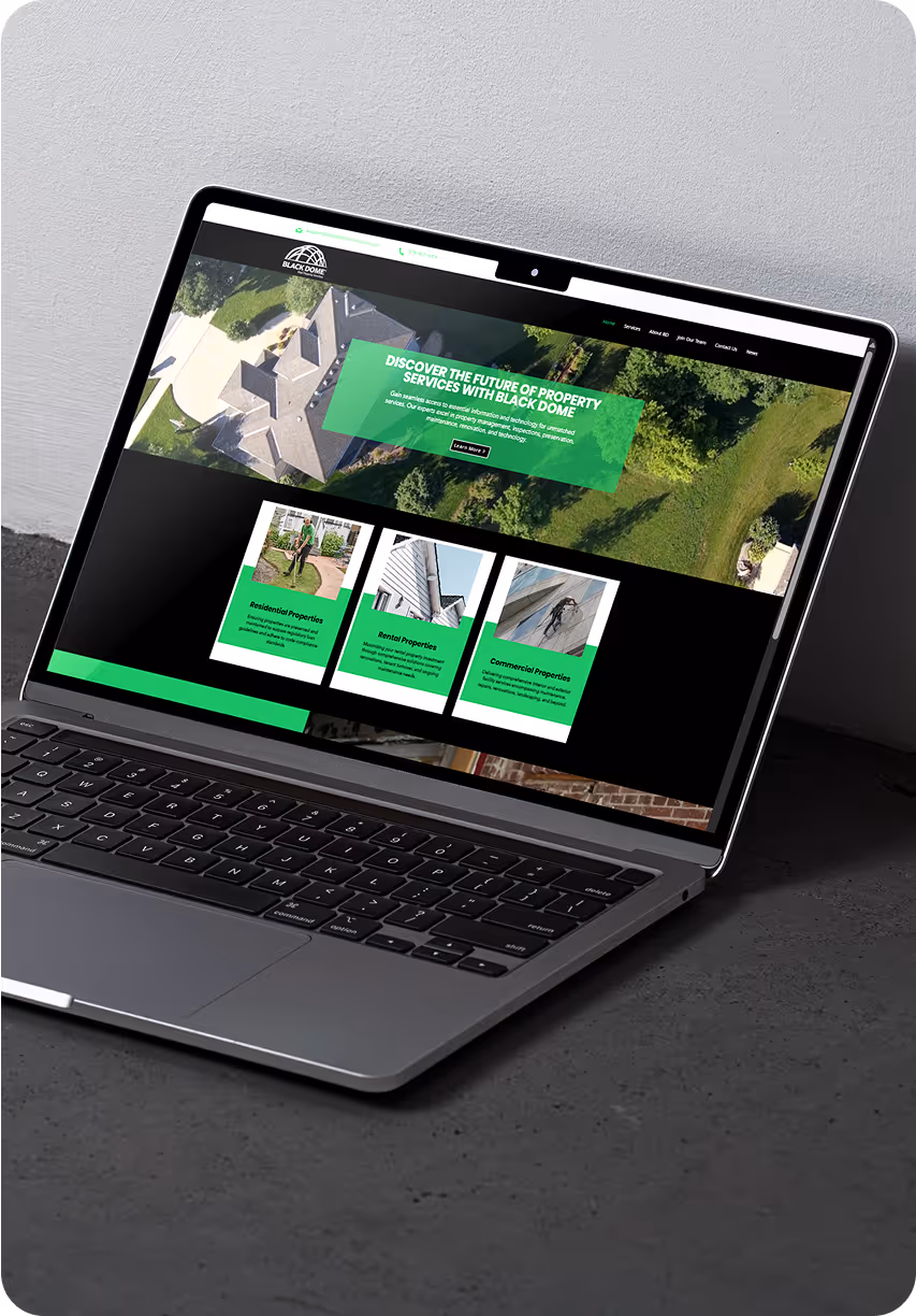 Custom UX/UI website design for Black Dome Services shown on a laptop screen with responsive layout and bold brand visuals.