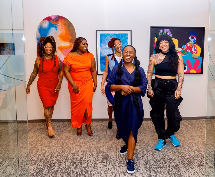 A group of women in an art gallery