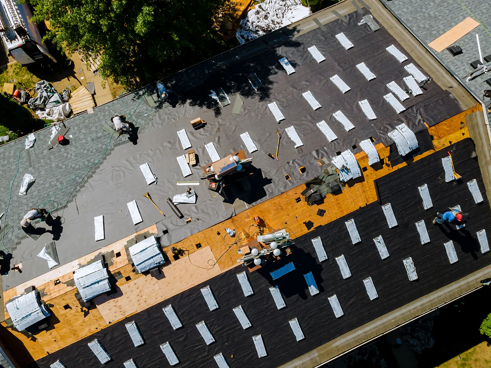 image of contractor on rooftop