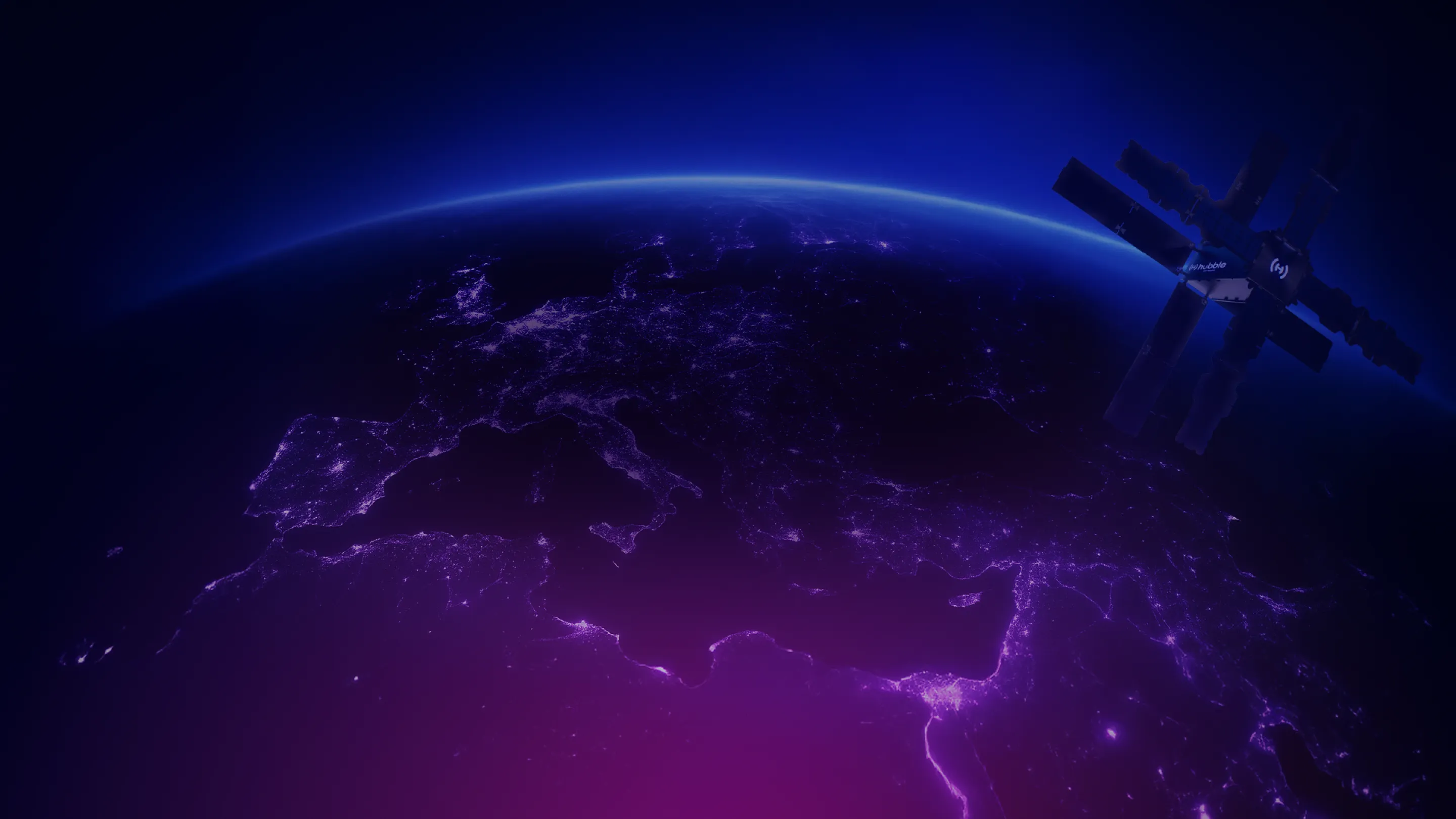 Satellite orbiting Earth over Europe and parts of Northern Africa at night with city lights visible.