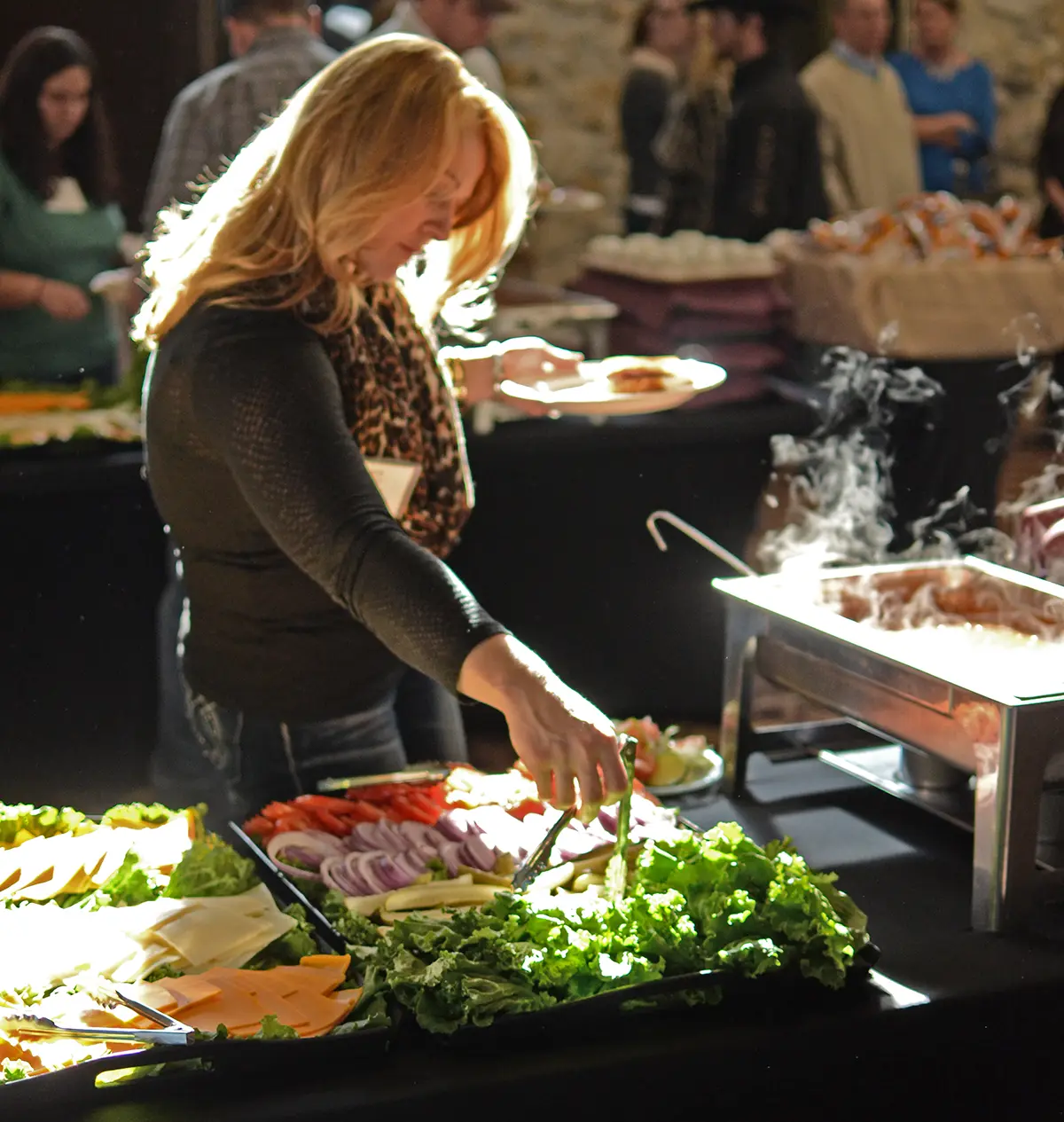 A backlit image of a food line at Ramada Midtown conference center.