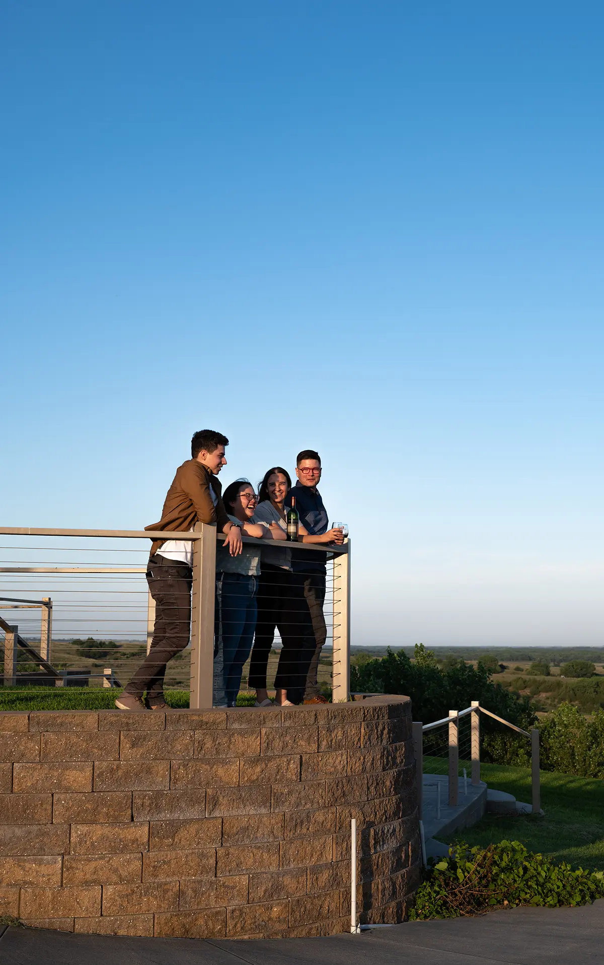 A group of young adults sip wine at Miletta Vista Winery in central Nebraska.