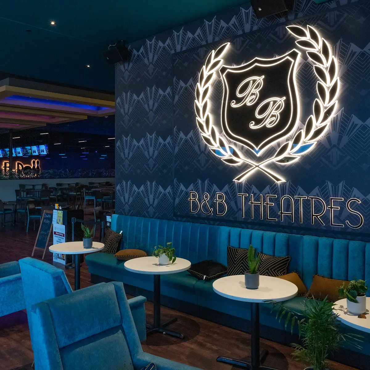 The new movie theater at Conestoga Marketplace features dining, an arcade, bowling, and pickleball courts.
