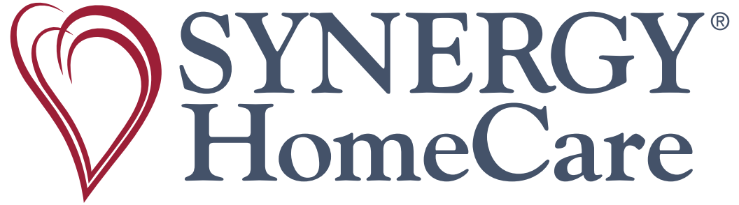 Synergy HomeCare logo with stylized heart icon and company name in blue and red.