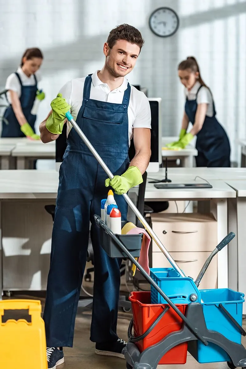 An image of a happy man cleaning