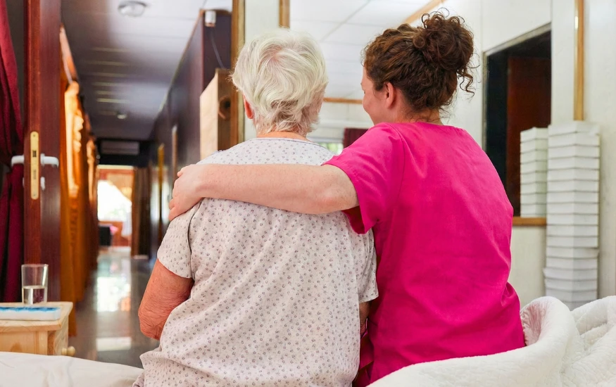 Nurse Next Door nurse providing palliative care at home