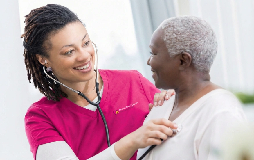 Nurse Next Door nurse providing post-operative care at home