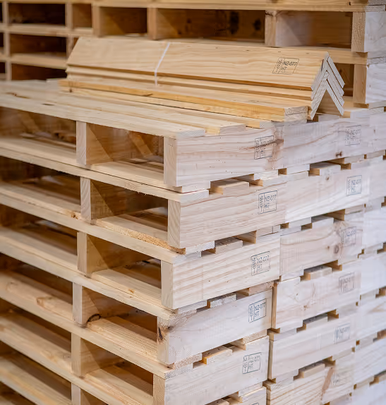 Shipping pallets stacked up in a pile