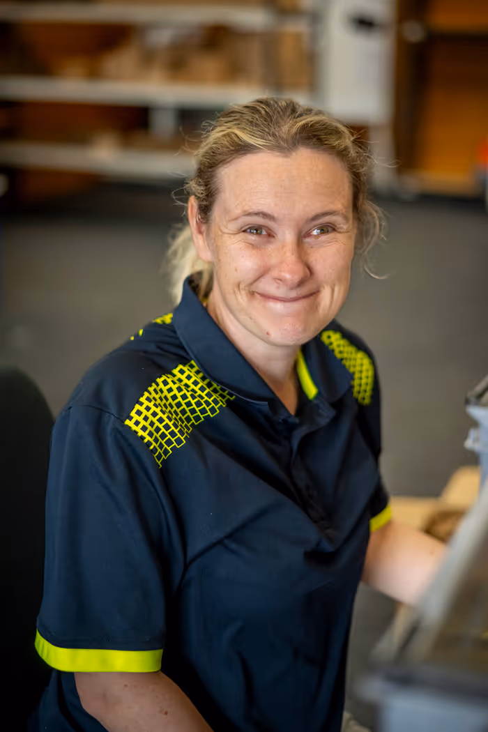 Photo of a smiley Cargill Enterprises' team member in the food packing department
