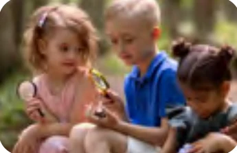 Children exploring nature outdoors