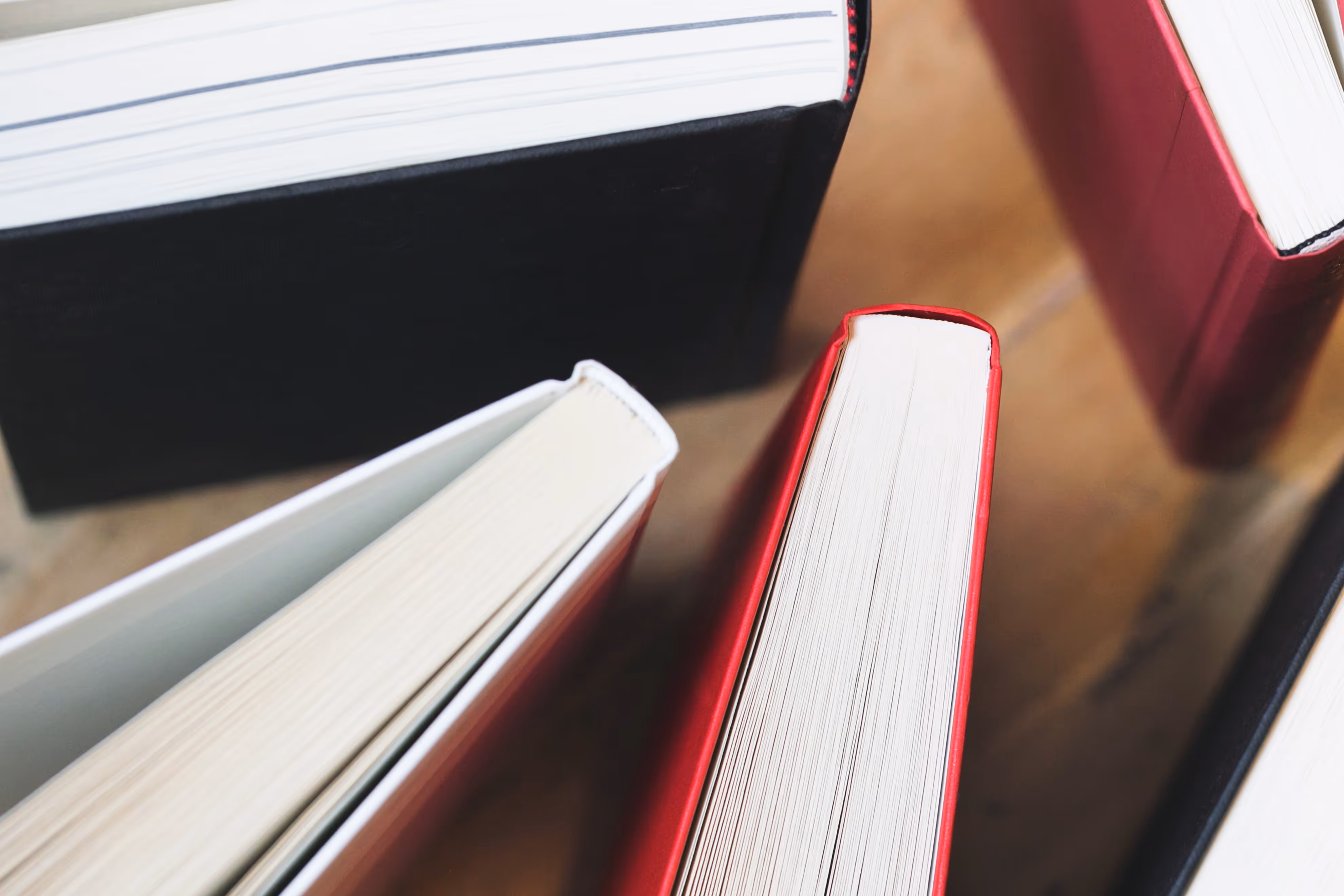 various coloured hardcover books standing up