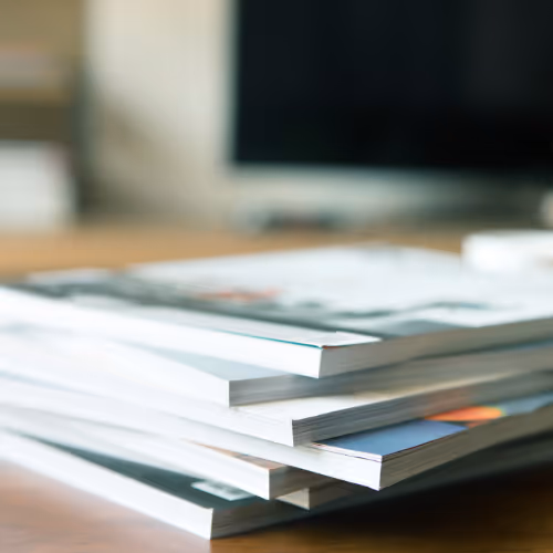 stack of annual report books