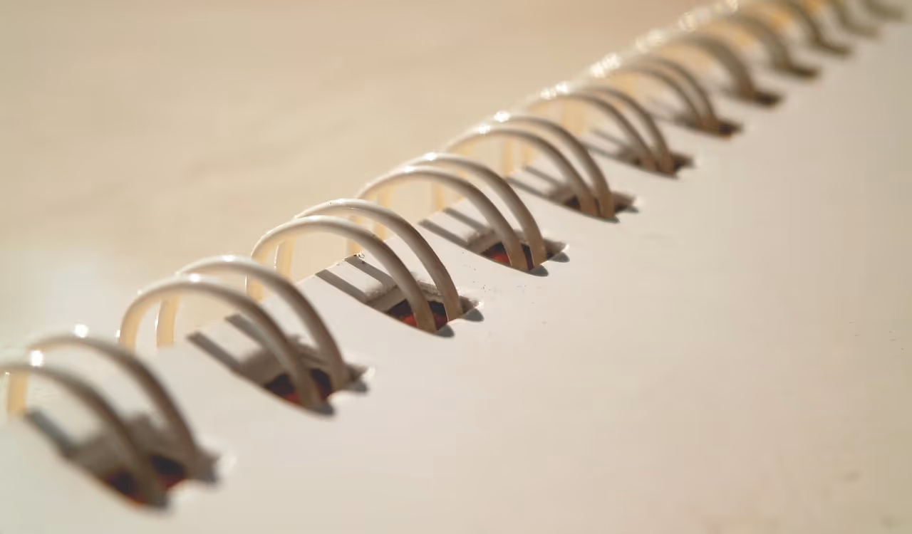 close up of a notebook's wire binding 