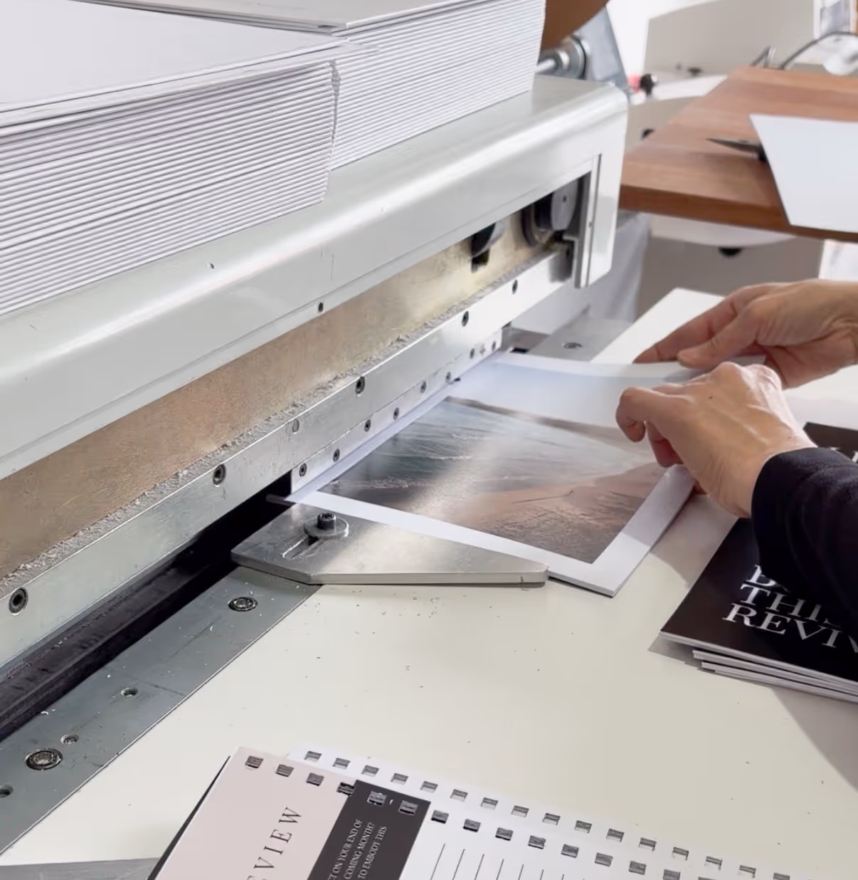 foliofox team member wire binding journals at the factory