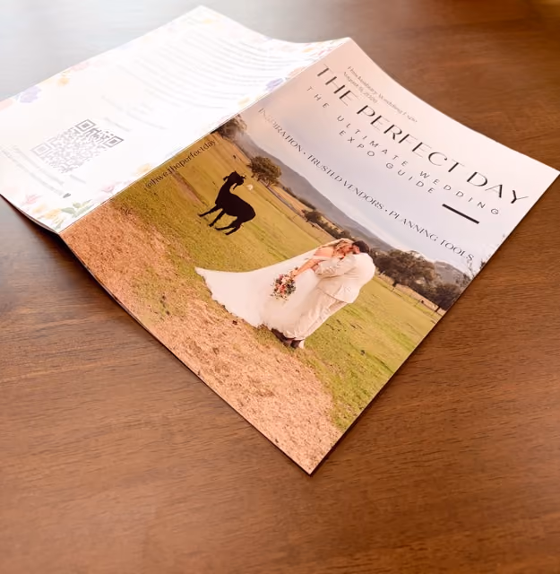 Facedown copy of a wedding expo event program booklet printed and bound by FolioFox