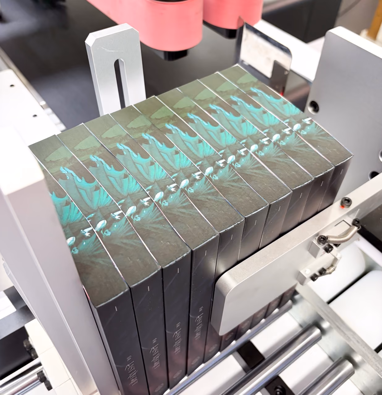 stack of books that have just been edge printed on the top edge of a book by Marie Gin