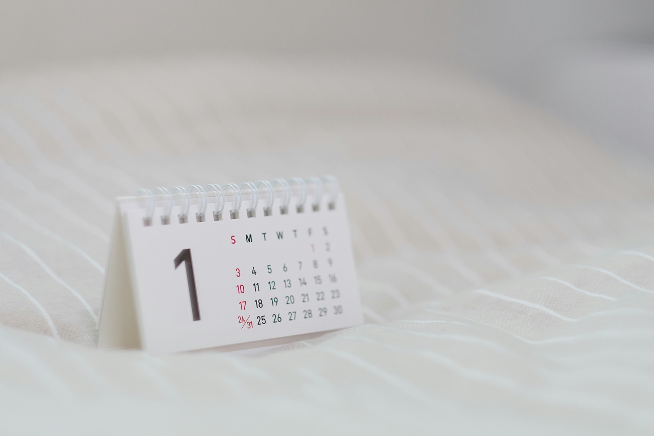 Tiny desk calendar that's spiral bound. 