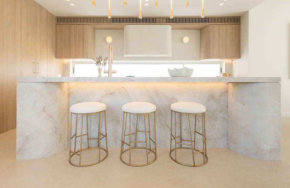 taj mahal quartzite kitchen island with round waterfal, fabrication into premium stone benchtops sydney