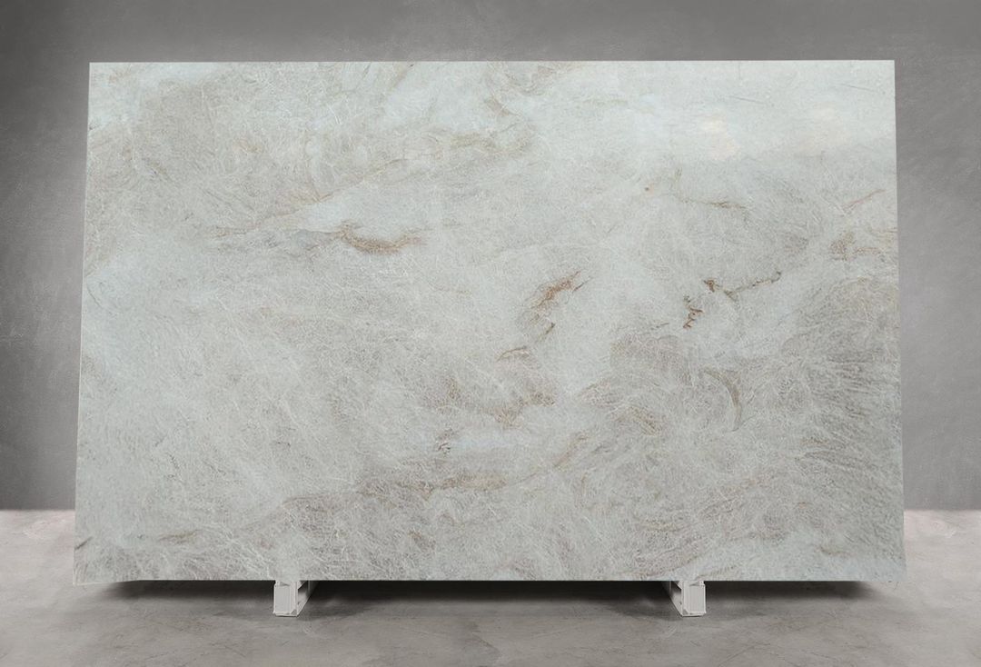 Large taj mahal quartzite slab resting outdoors, ready for fabrication into premium stone benchtops sydney
