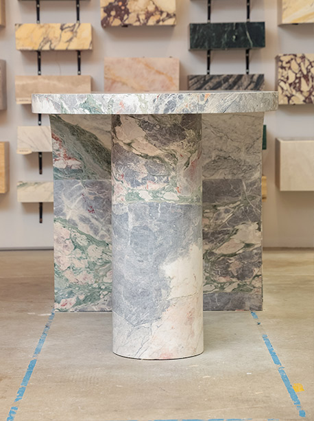 Curved waterfall end on a Six Senses Marble island, honed finish, sweeping stone return to floor, Marble Hub Sydney