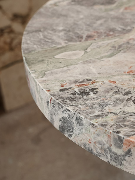 Curved waterfall end on a Six Senses Marble island, honed finish, sweeping stone return to floor, Marble Hub Sydney