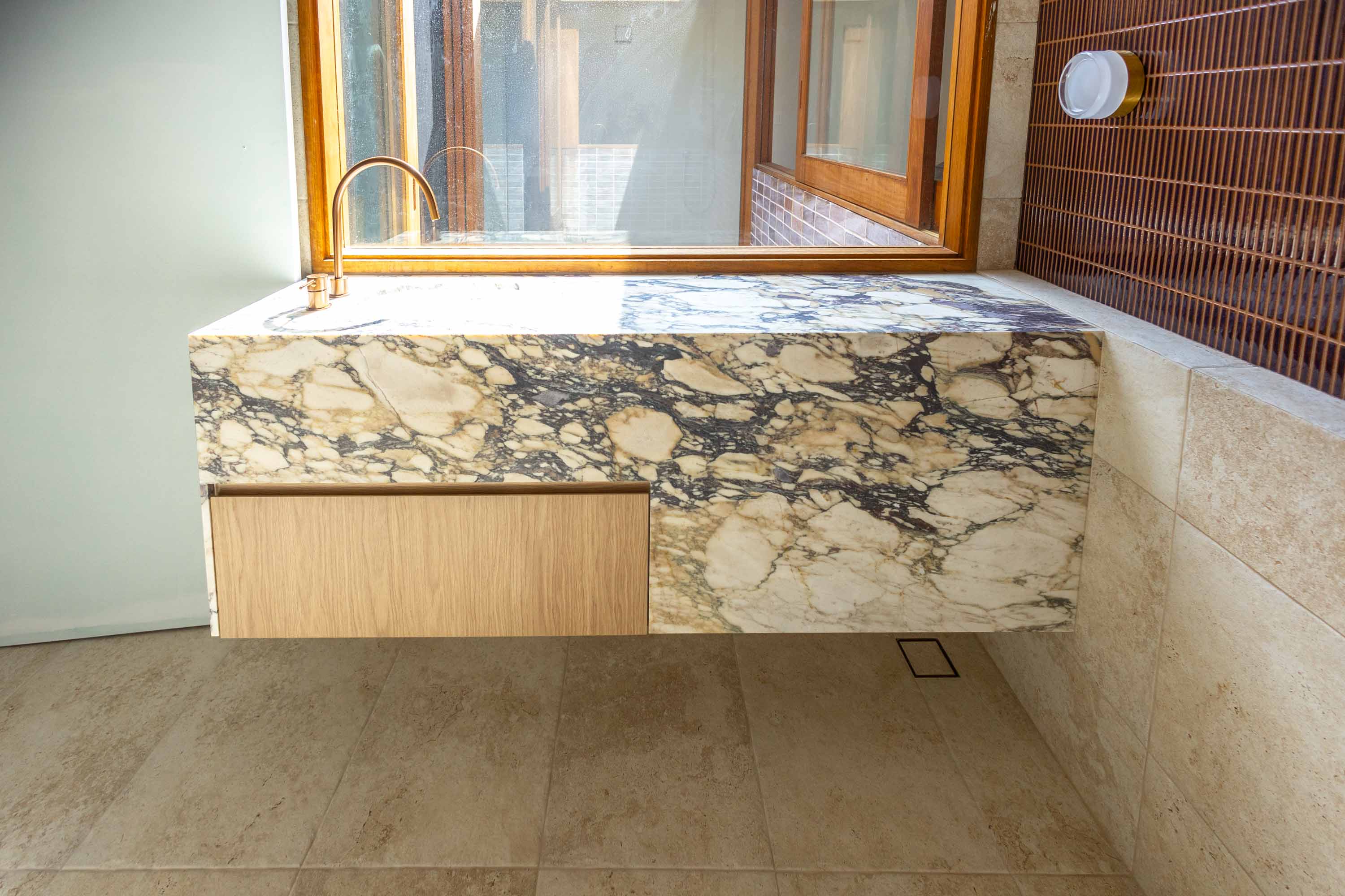 Calacatta Viola marble vanity, waterfall edge, oak drawer, Sydney bathroom