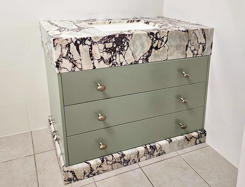 Calacatta Viola marble vanity top, thick mitred apron, sage green joinery, undermount basin, Sydney bathroom