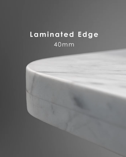 Laminated 40mm edge on a marble benchtop, built-up thickness with a softly rounded front.