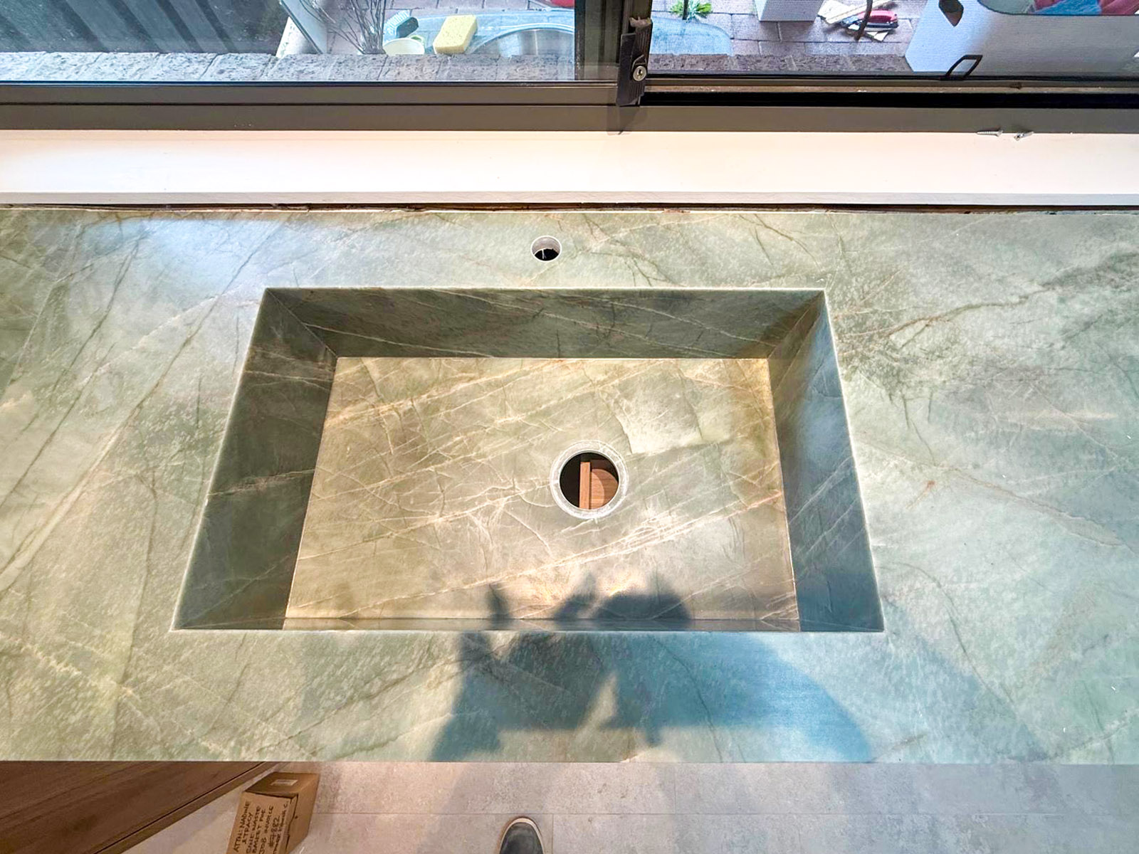Integrated stone sink fabricated from Esmeralda emerald green quartzite, Sydney