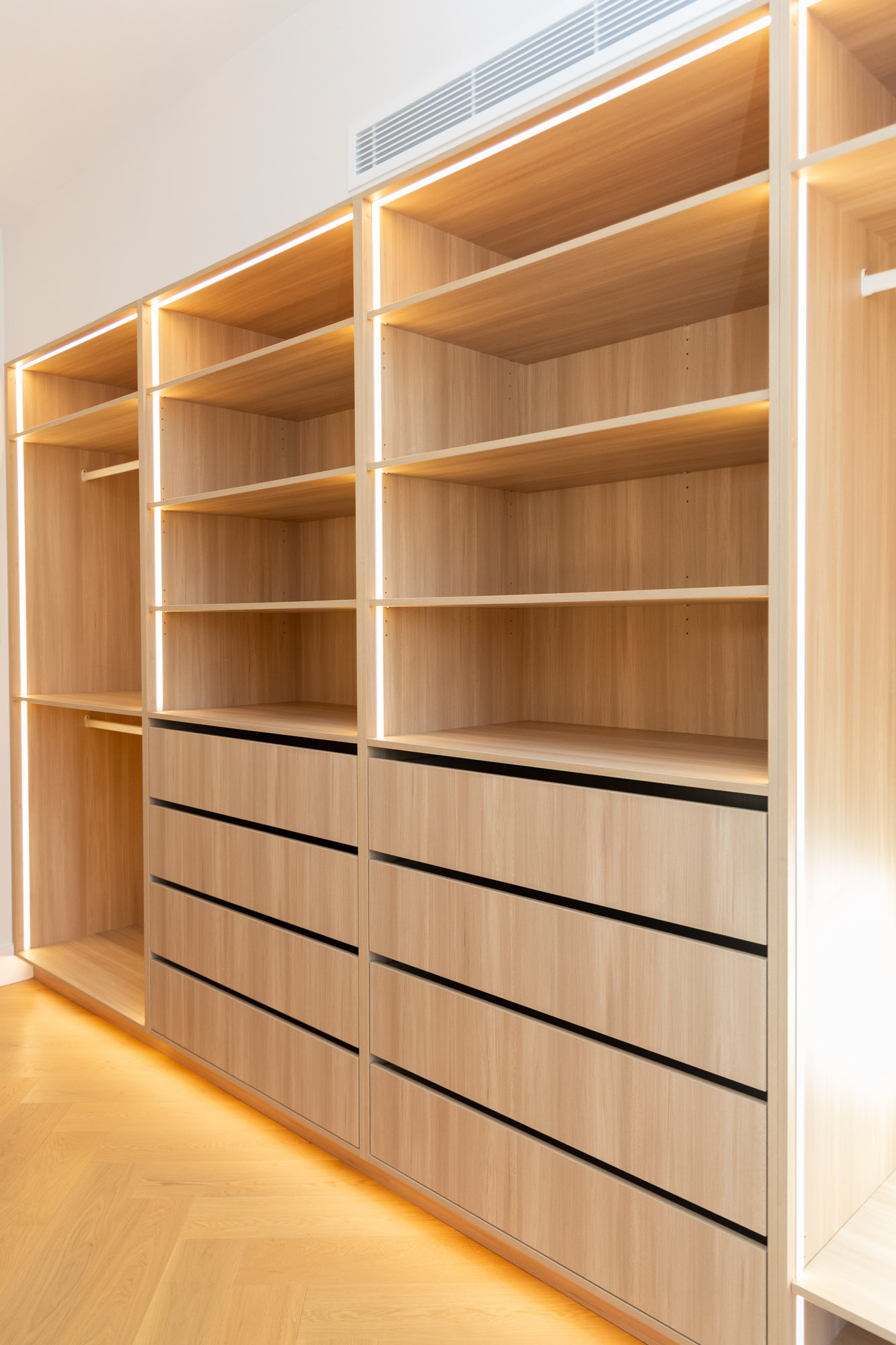Polytec Plantation Ash Woodmatt walk-in robe joinery with LED lighting, Randwick, Sydney