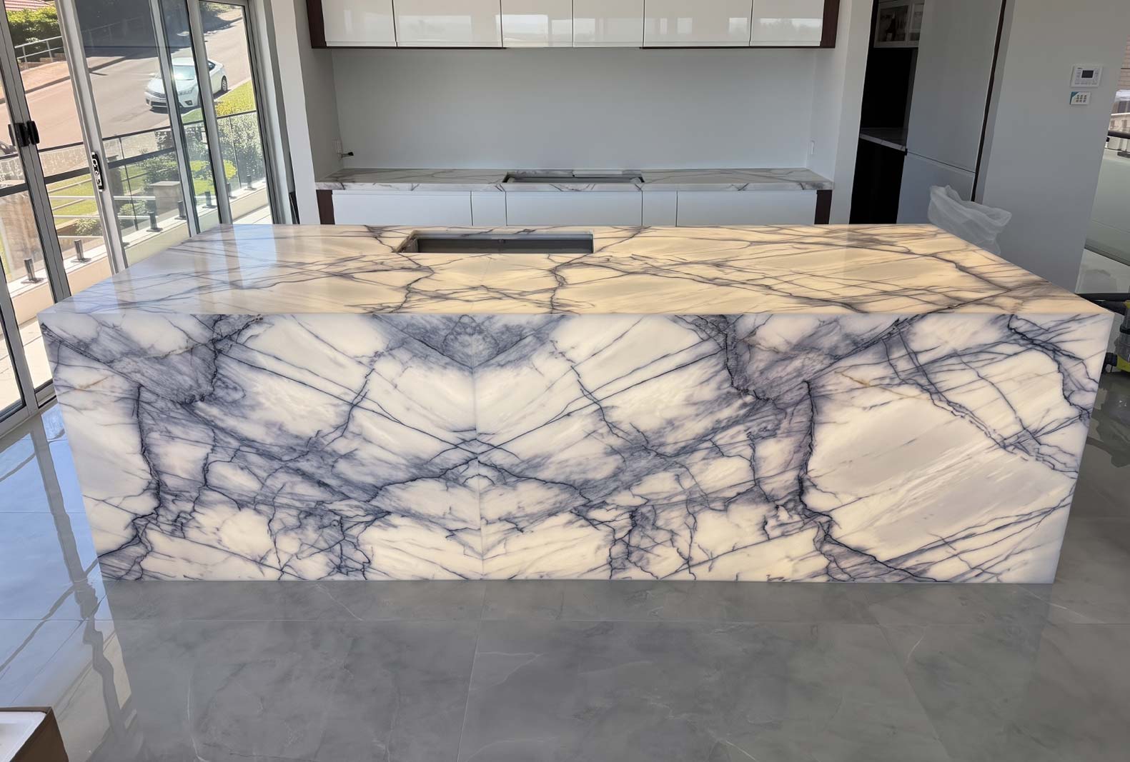 Backlit translucent stone feature panel glowing evenly with LED lighting, Marble Hub Sydney