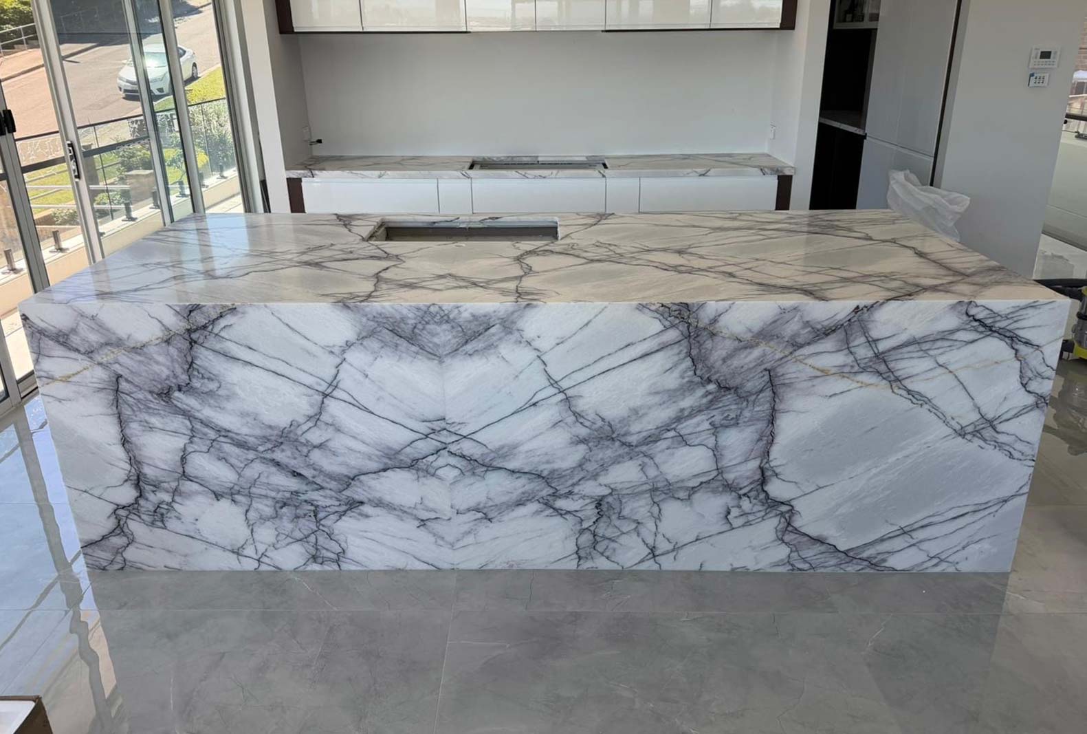 Backlit translucent stone feature panel glowing evenly with LED lighting, Marble Hub Sydney