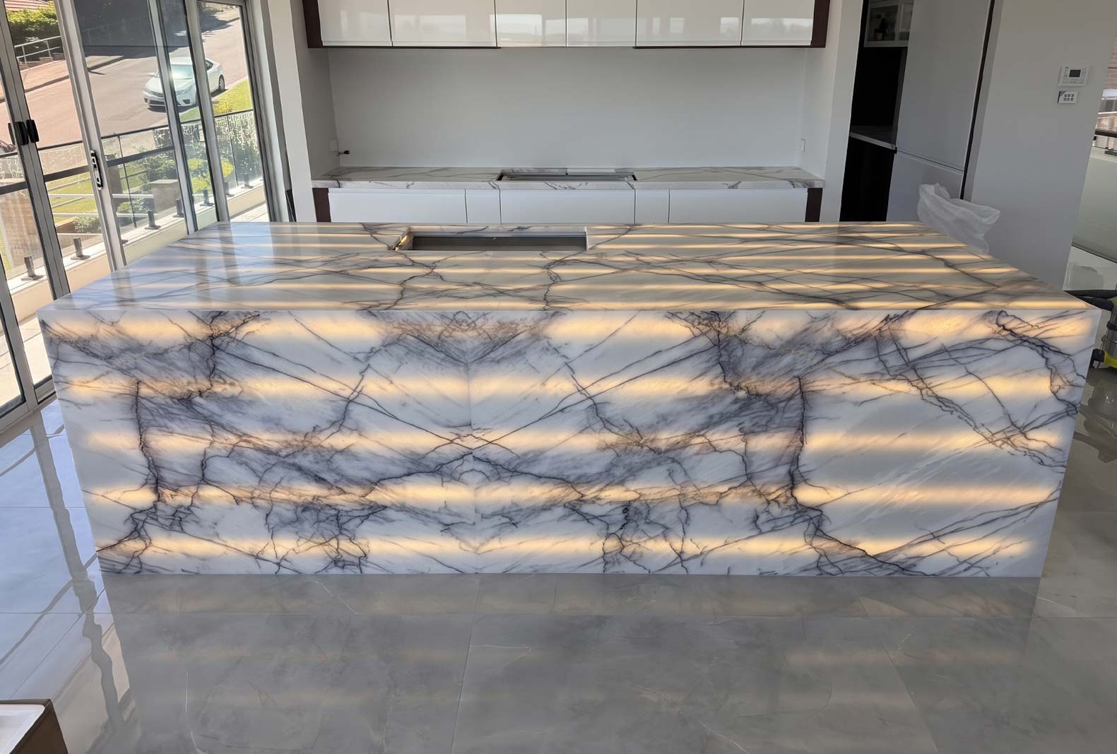 Backlit onyx feature glowing evenly with a full LED panel, Marble Hub Sydney