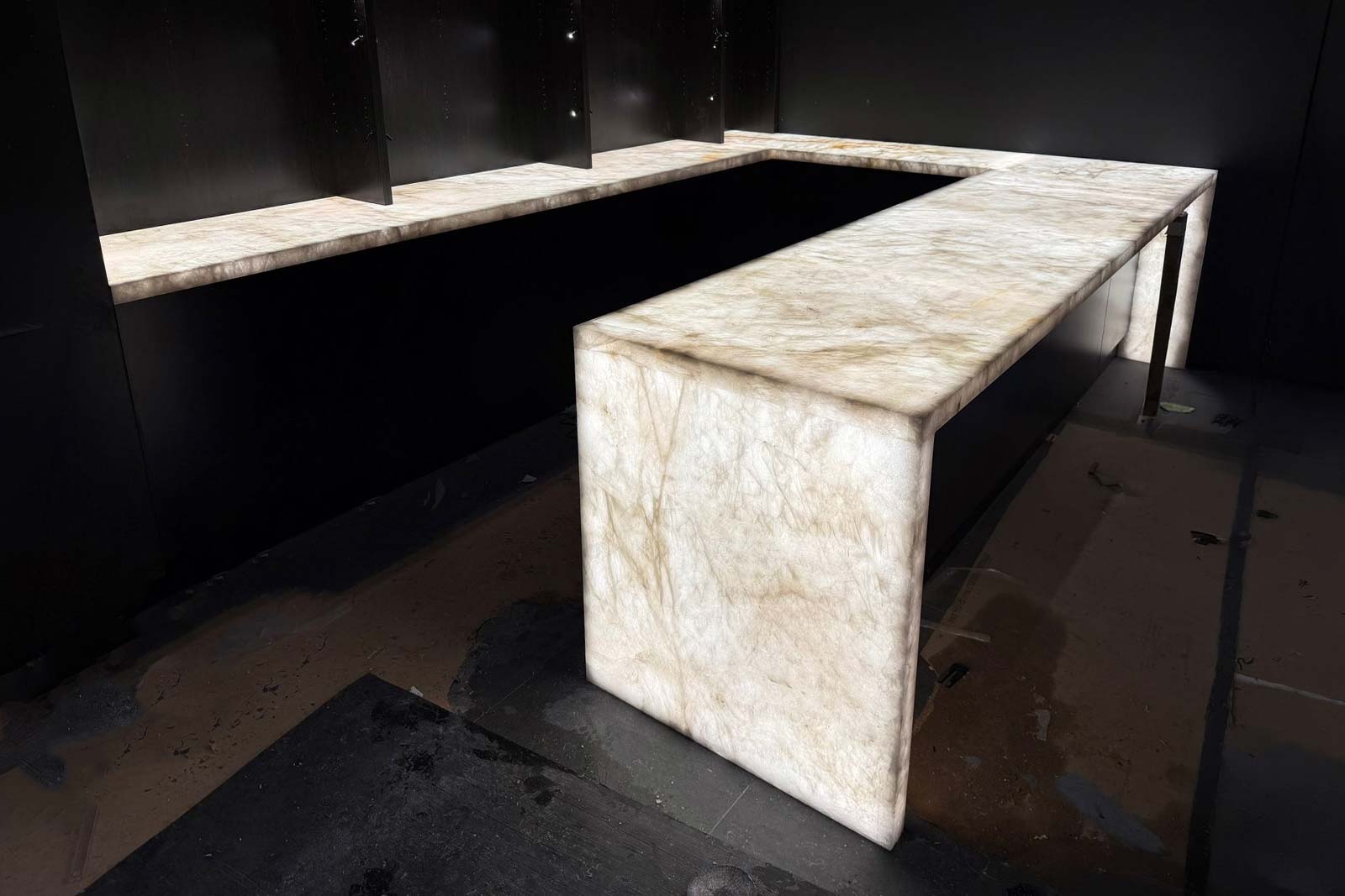 acklit translucent stone feature panel glowing evenly with LED lighting, Marble Hub Sydney