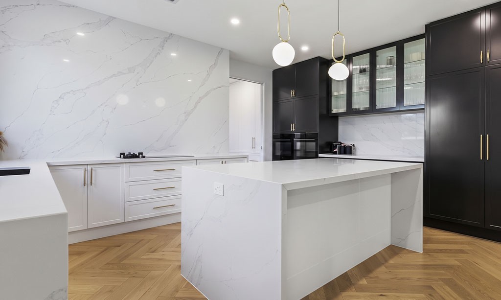 Porcelain full slab splashback continuing benchtop veining up the wall, Sydney kitchen