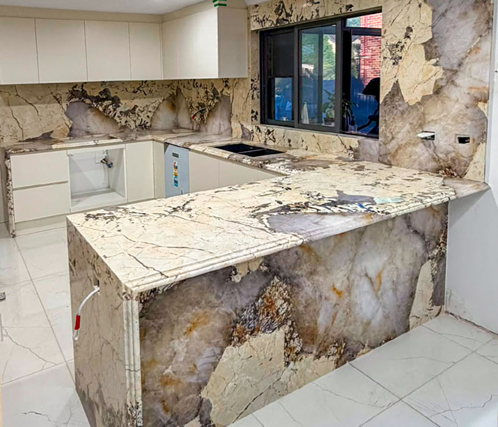 Patagonia quartzite kitchen with a single waterfall end, Sydney 