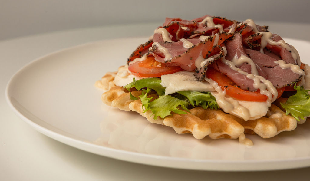 Wheat waffle with pastrami