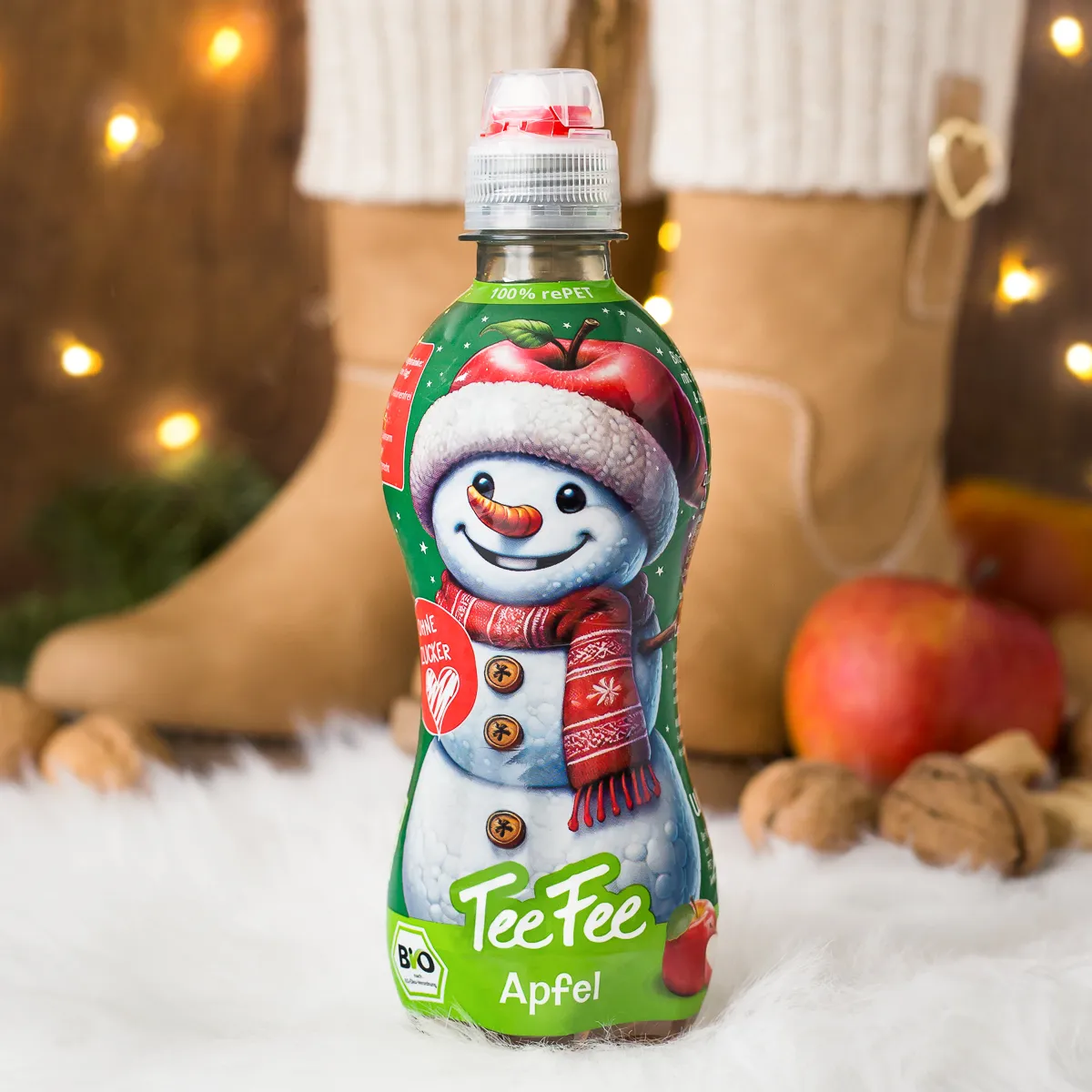 TeeFee Apfel mit weihnachtlichem Hintergrund