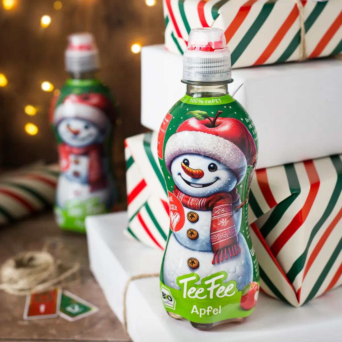 TeeFee Apfel mit weihnachtlichem Hintergrund