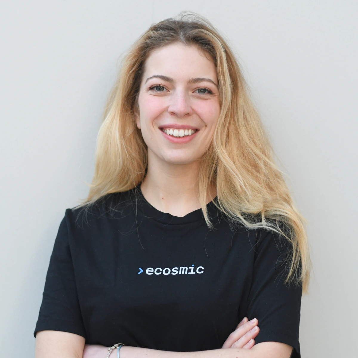 A professional headshot of Martina