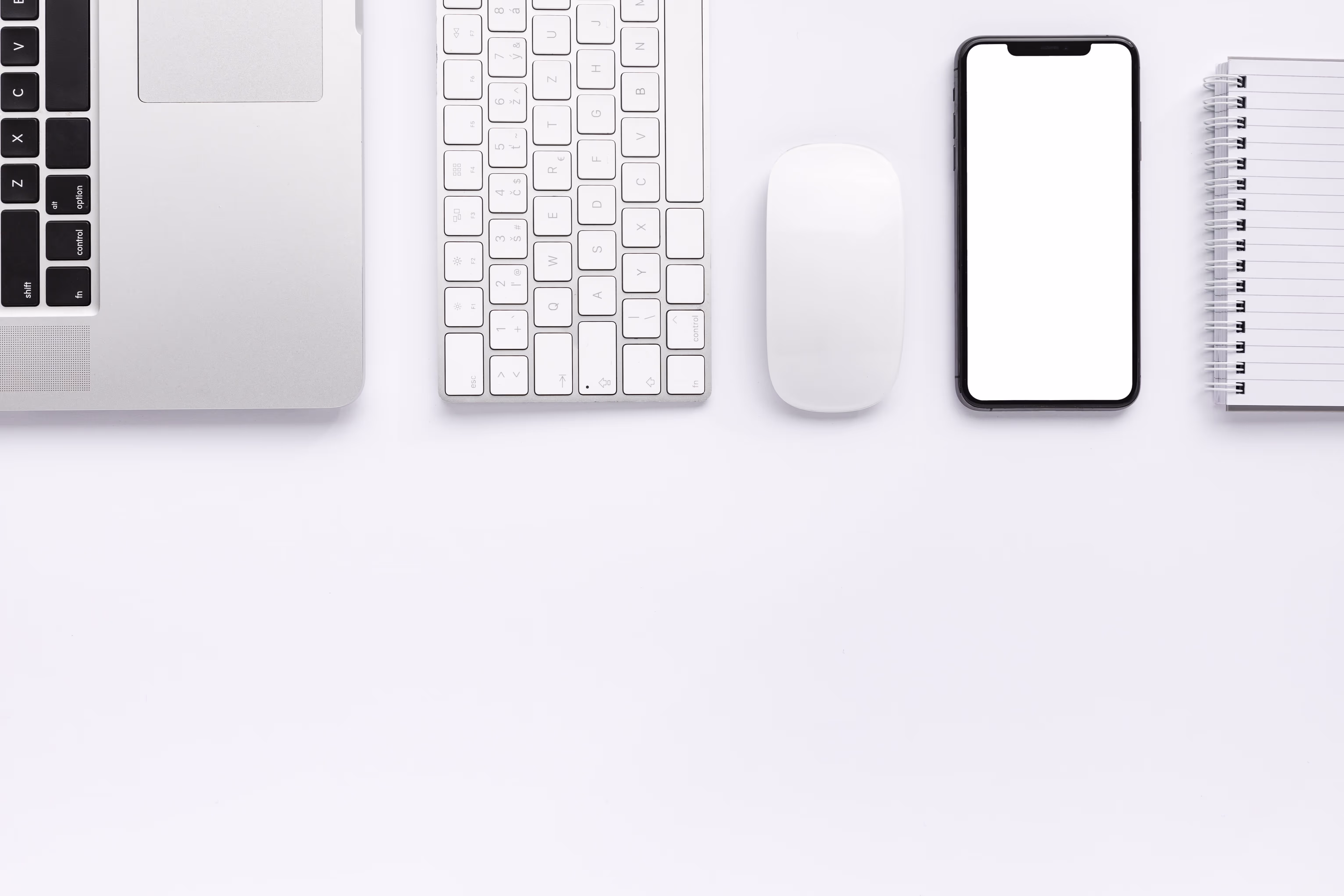 Office computer, keyboard, mouse, phone and agenda.