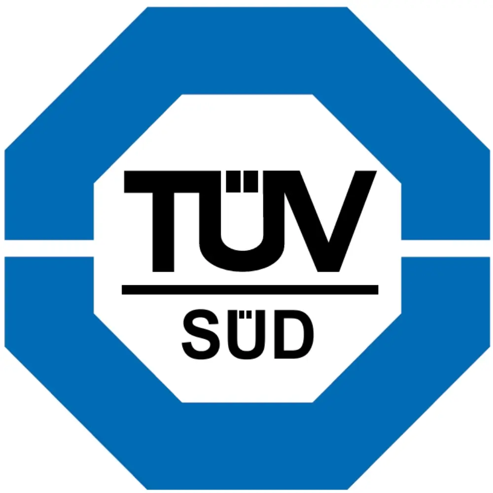 Logo blu a forma ottagonale con testo nero TÜV SÜD al centro.