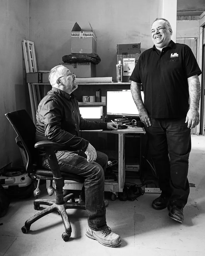 Two managers talking at an LDB site