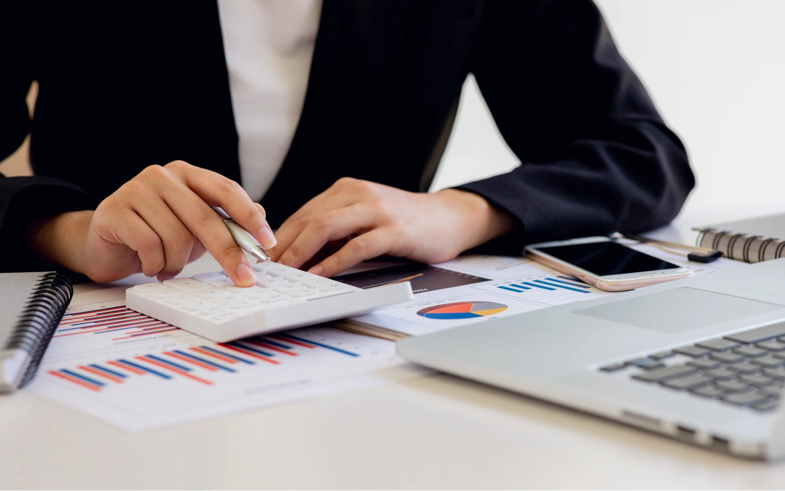 Image of accountant preparing reports for use in a tax return