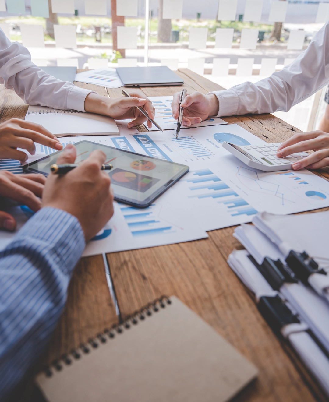 Image of accountants reviewing reports