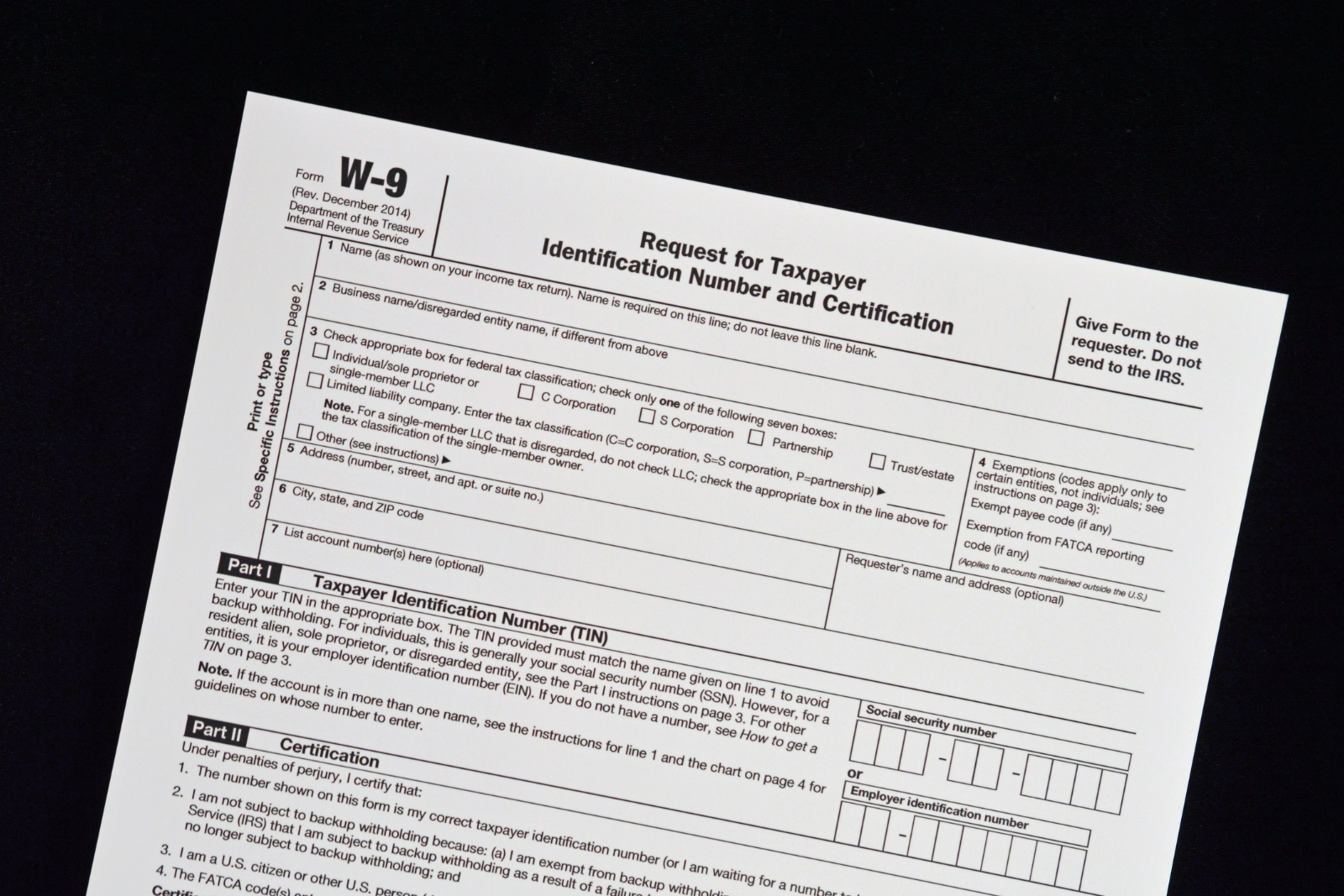 Image of tax form on black background