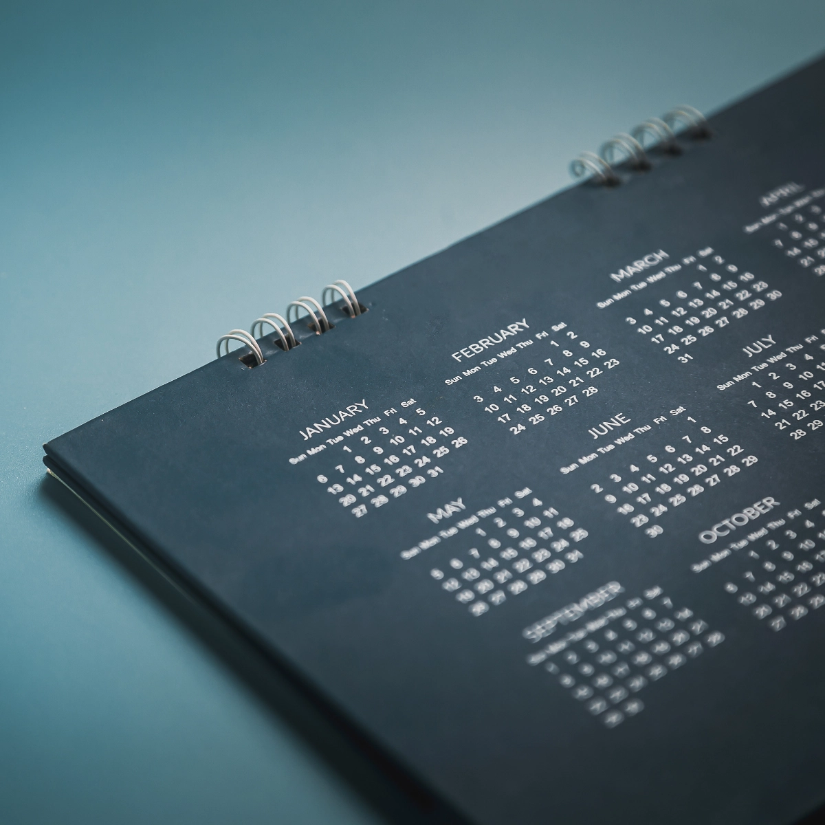 Image of a calendar on light blue.