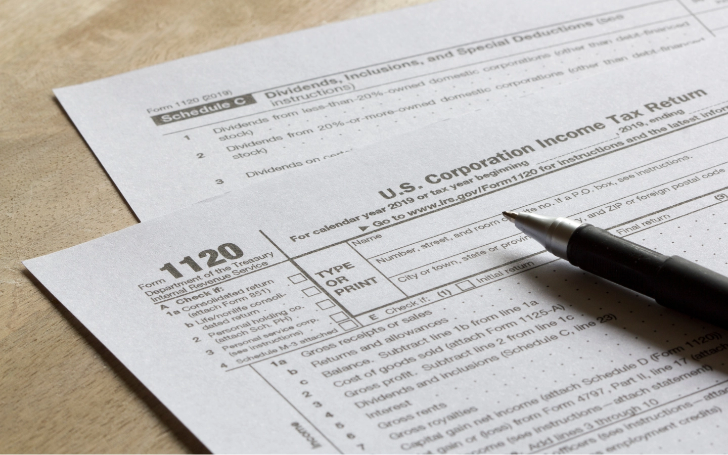 Image of person signing contract