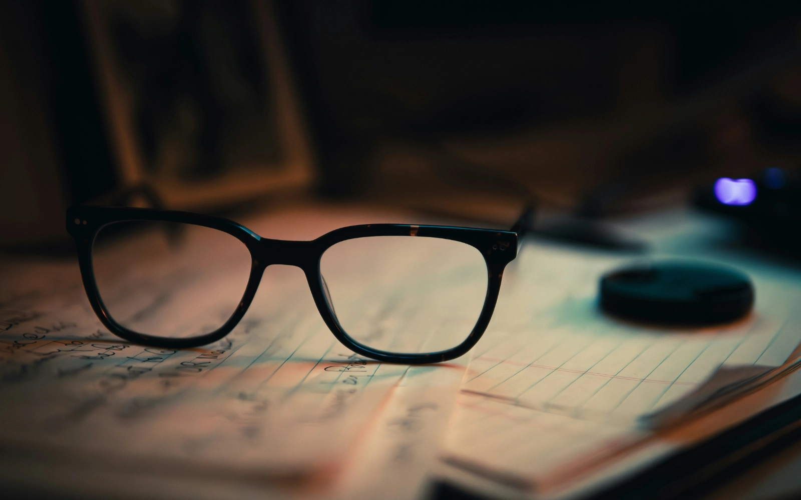 Image of glasses on paper during audit